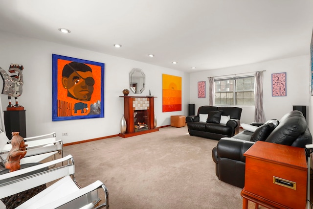 carpeted living room featuring recessed lighting, a fireplace, and baseboards