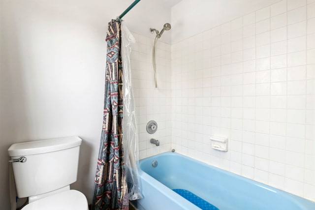 full bath with shower / bath combination with curtain and toilet