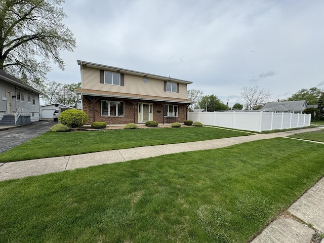 view of front of property with a front lawn