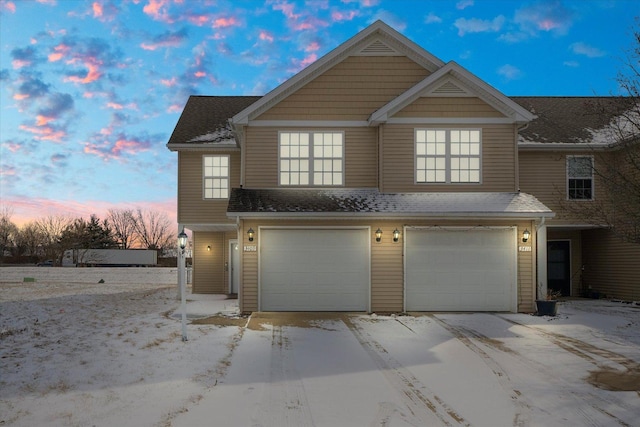 front facade with a garage