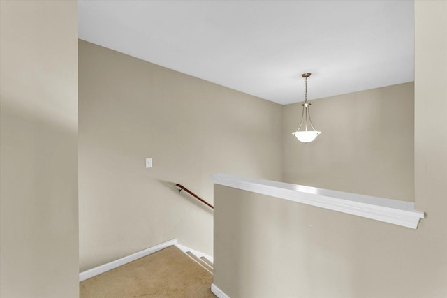 hall featuring carpet