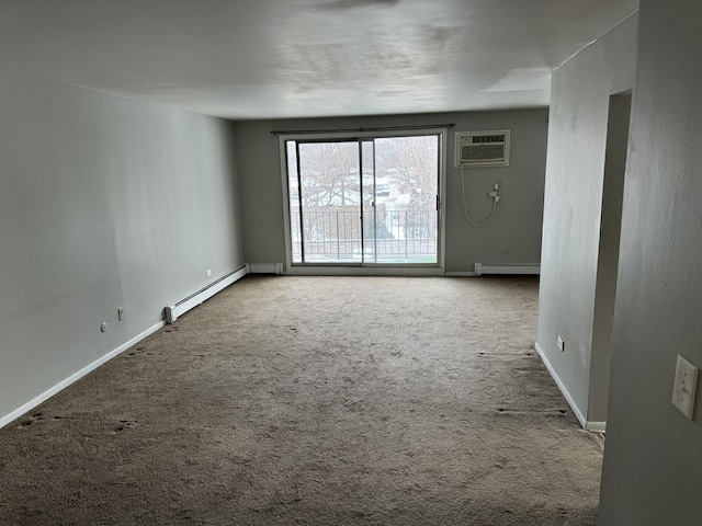 carpeted empty room featuring a baseboard heating unit and a wall mounted AC