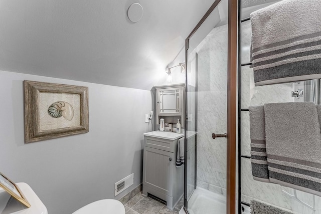 1756 Winaki Trl, Algonquin, IL 60102 - full bath with a stall shower, vanity, vaulted ceiling, toilet, and baseboards