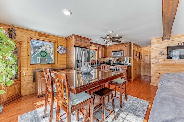 1756 Winaki Trl, Algonquin, IL 60102 - dining space featuring wooden walls, plenty of natural light, recessed lighting, light wood-style flooring, and a ceiling fan