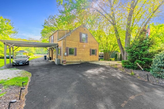 1756 Winaki Trl, Algonquin, IL 60102 - view of property exterior featuring driveway and a carport