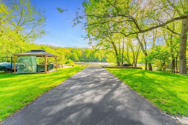1756 Winaki Trl, Algonquin, IL 60102 - view of home's community featuring a gazebo, a yard, and a forest view