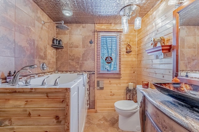 1756 Winaki Trl, Algonquin, IL 60102 - bathroom featuring vanity, tiled shower, toilet, tile walls, and a bath