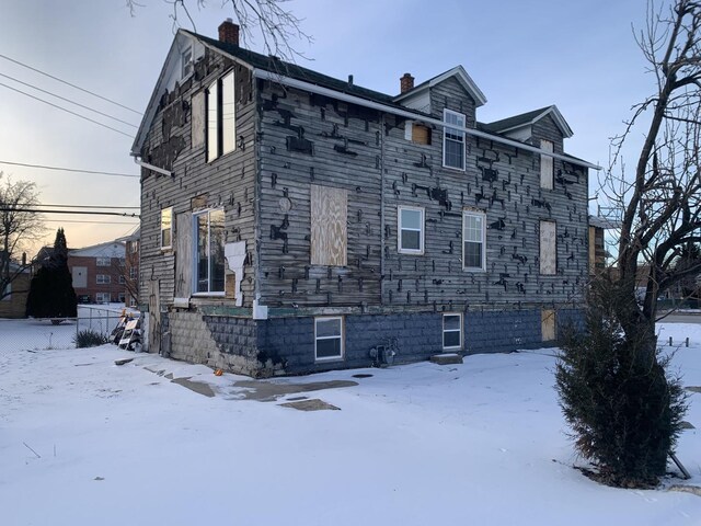 view of snow covered property