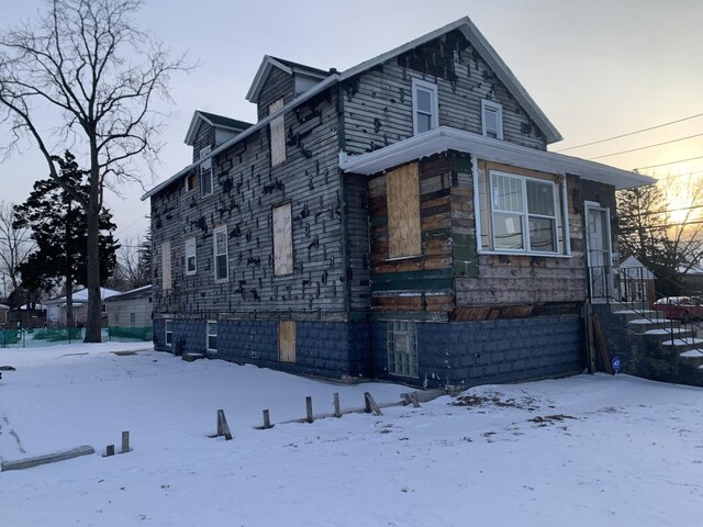 view of snow covered property