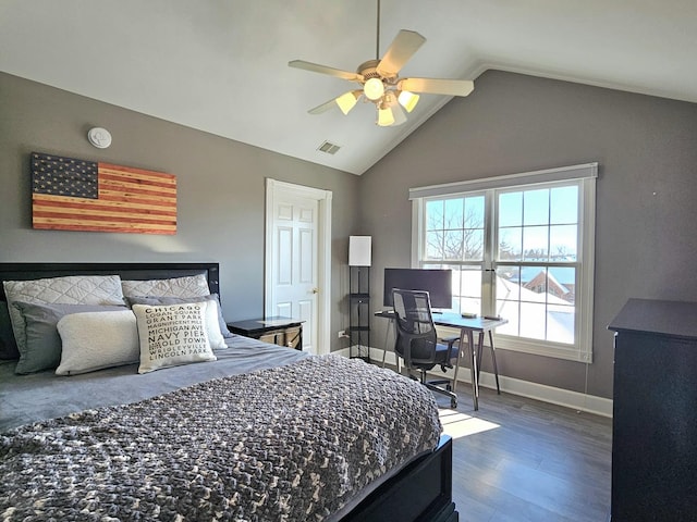 bedroom featuring dark hardwood / wood-style flooring, lofted ceiling, and ceiling fan