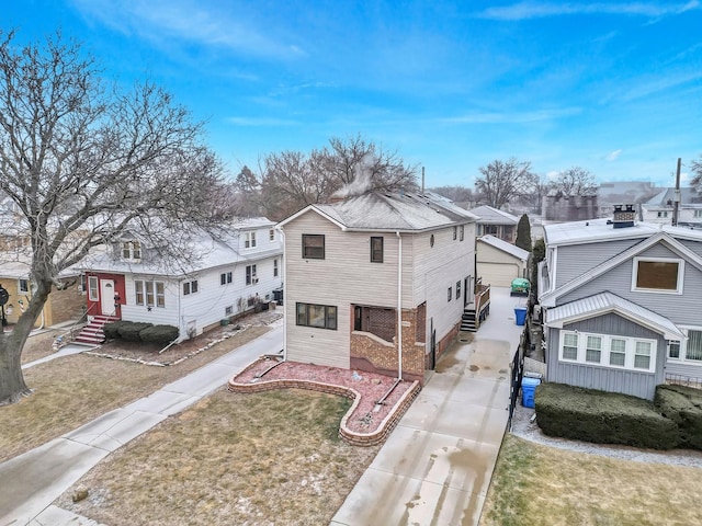 view of front of property with a front yard and a residential view