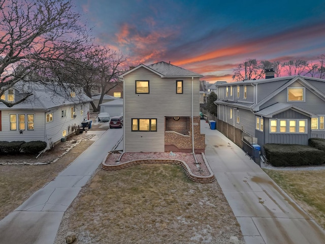 view of front of home with a front lawn and driveway