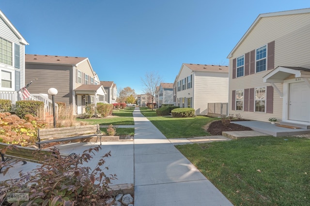 surrounding community featuring a lawn