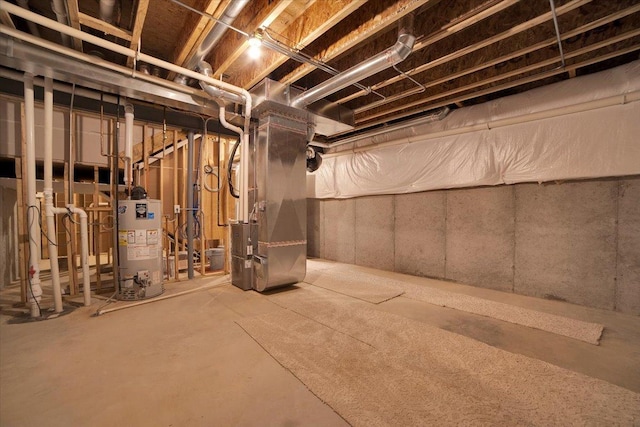 basement featuring heating unit and gas water heater