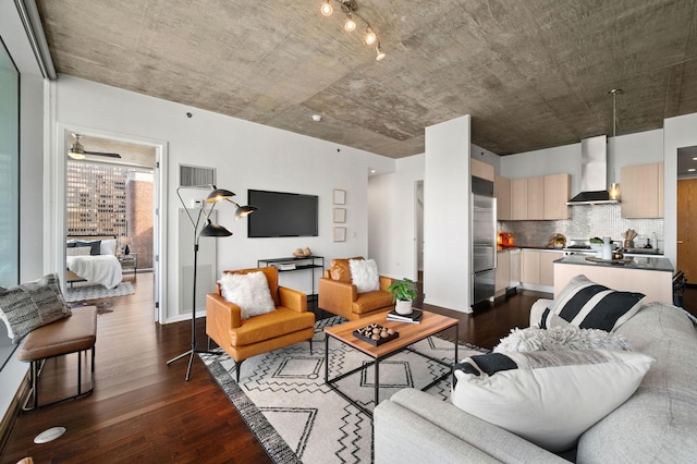 living room with dark hardwood / wood-style flooring