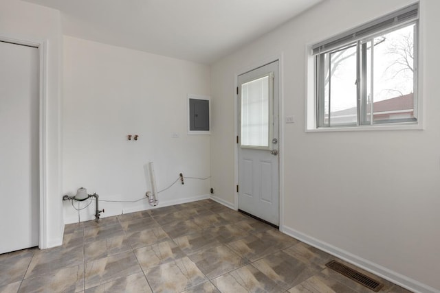 laundry area featuring electric panel