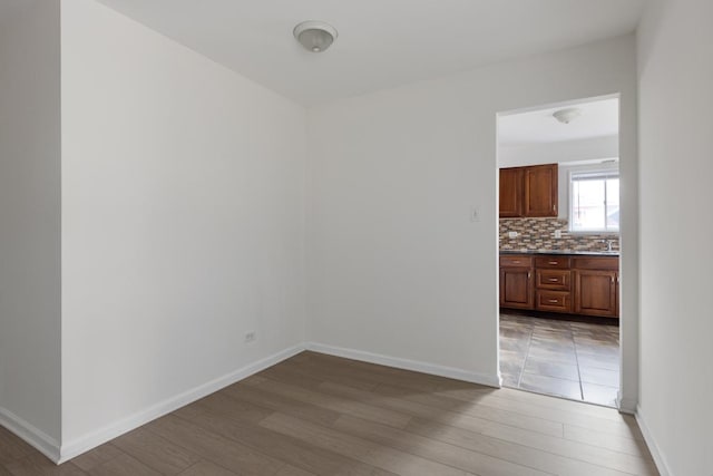 unfurnished room featuring light hardwood / wood-style floors