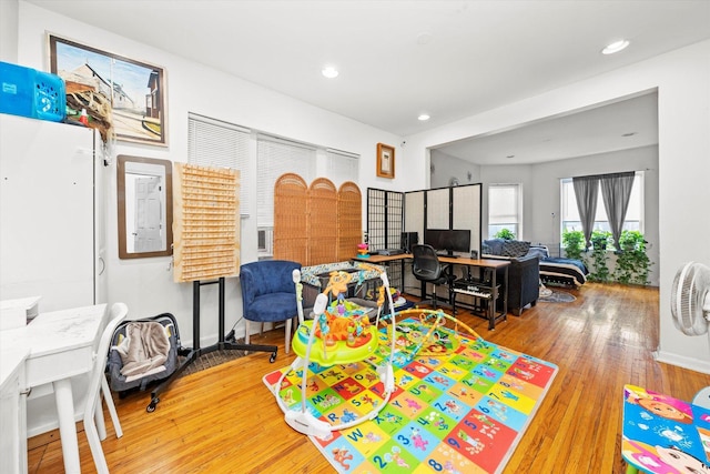 recreation room with hardwood / wood-style flooring