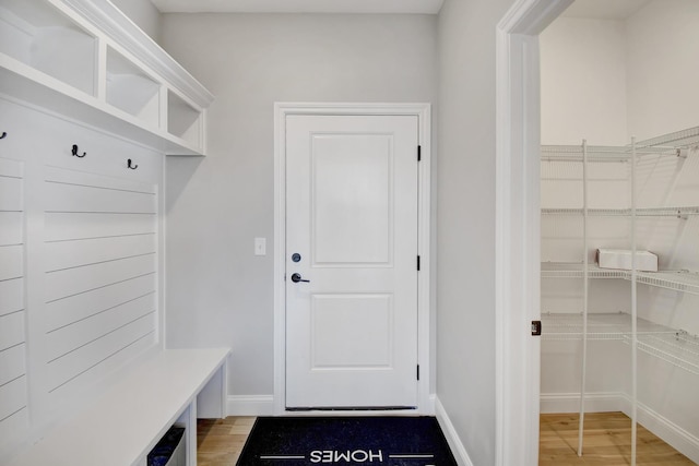 1713 Littlefield Ln, Mahomet, IL 61853 - mudroom with light wood-style flooring and baseboards