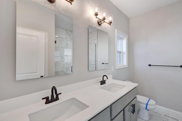 1713 Littlefield Ln, Mahomet, IL 61853 - full bathroom featuring marble look tile flooring, toilet, a tile shower, double vanity, and baseboards
