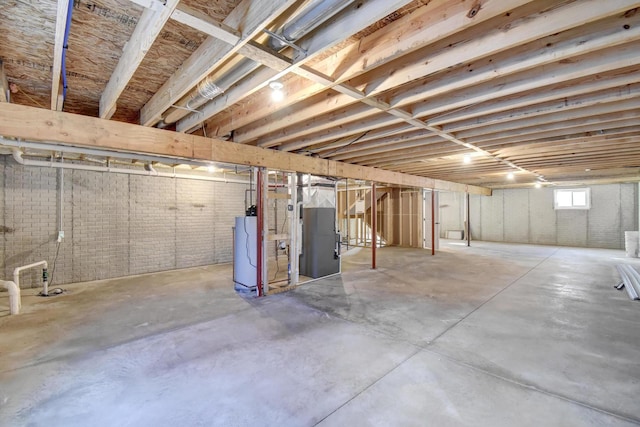 1713 Littlefield Ln, Mahomet, IL 61853 - basement with water heater and heating unit