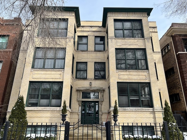 view of property featuring a fenced front yard