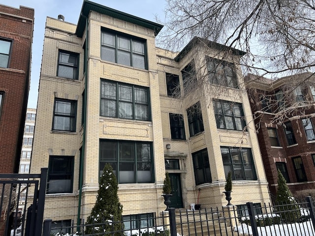 view of property featuring a fenced front yard