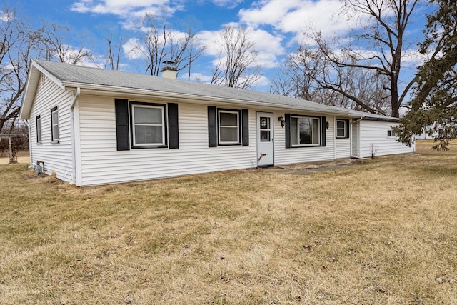 ranch-style house with a front yard