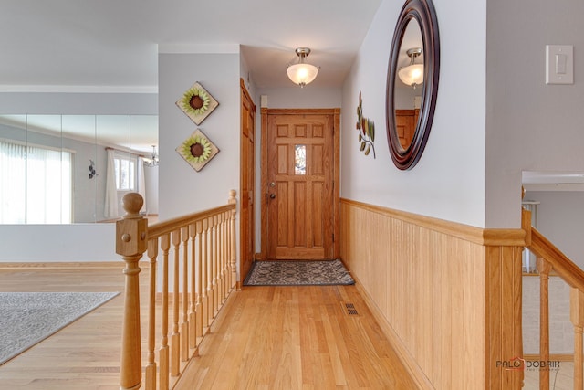 doorway to outside featuring light hardwood / wood-style floors