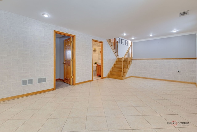 empty room with light tile patterned flooring