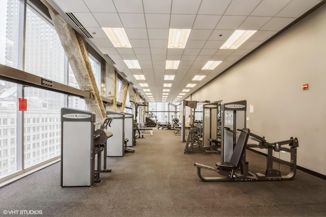 gym with a drop ceiling