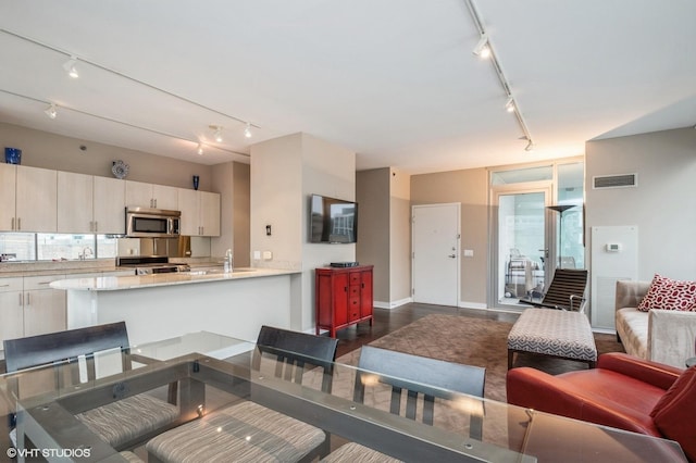 living room featuring track lighting
