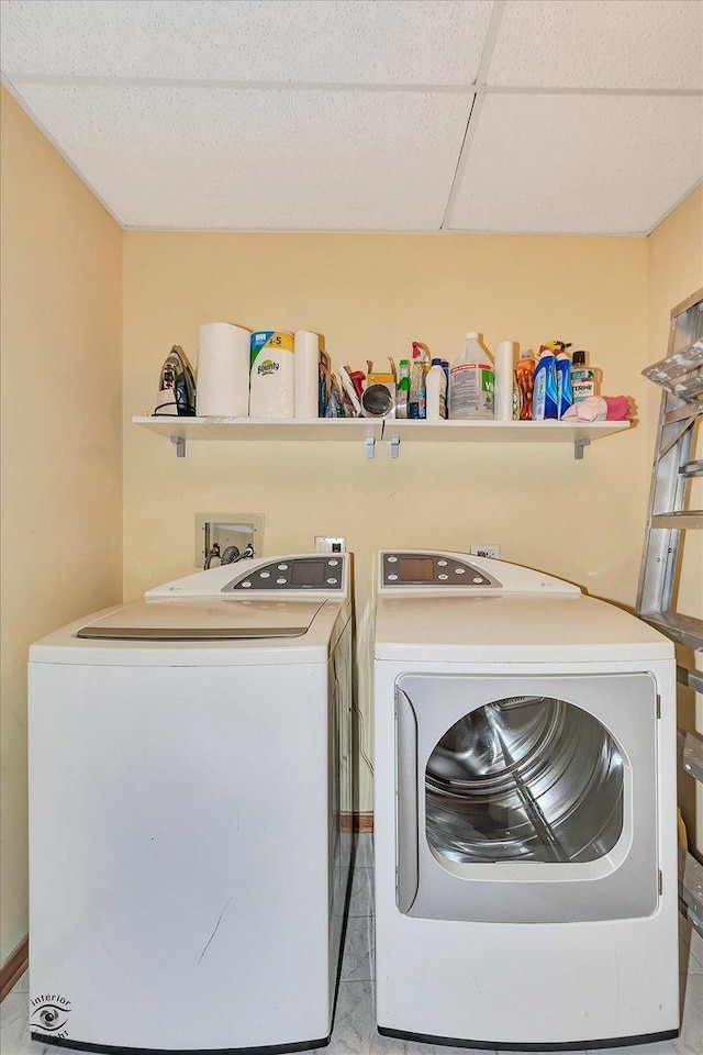 laundry area featuring laundry area and washer and dryer