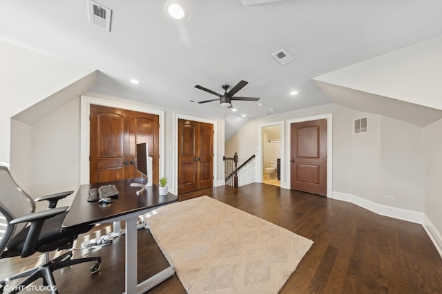 office featuring lofted ceiling and dark hardwood / wood-style flooring