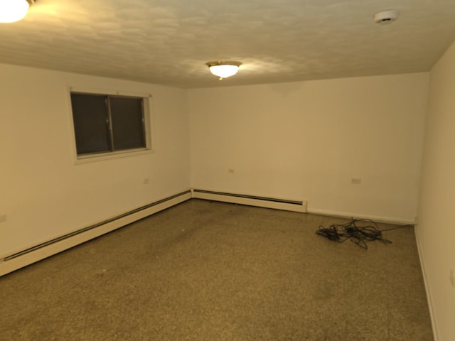 empty room featuring a baseboard radiator