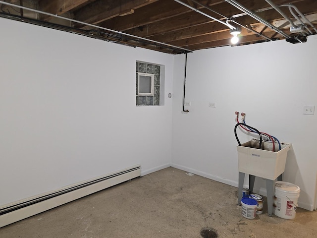 basement featuring a baseboard radiator