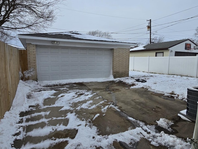 view of snow covered garage