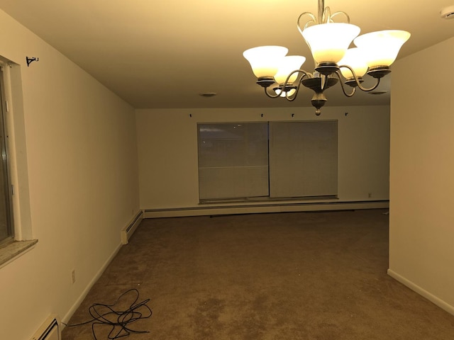 carpeted spare room with an inviting chandelier and a baseboard heating unit