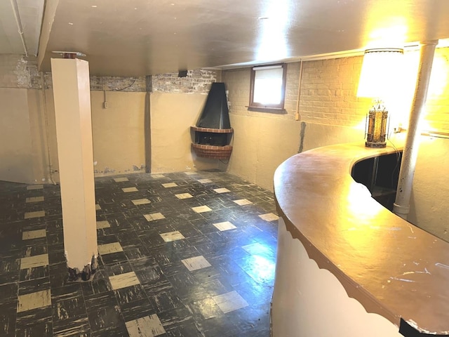 below grade area with tile patterned floors