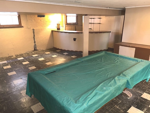 game room with crown molding, a wealth of natural light, billiards, and tile patterned floors