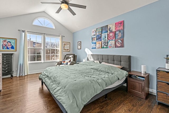 bedroom with lofted ceiling, ceiling fan, baseboards, and dark wood finished floors