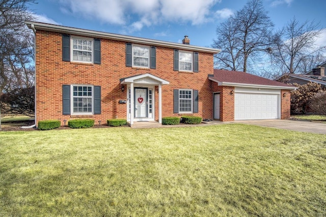 colonial home with aphalt driveway, a garage, brick siding, a front lawn, and a chimney