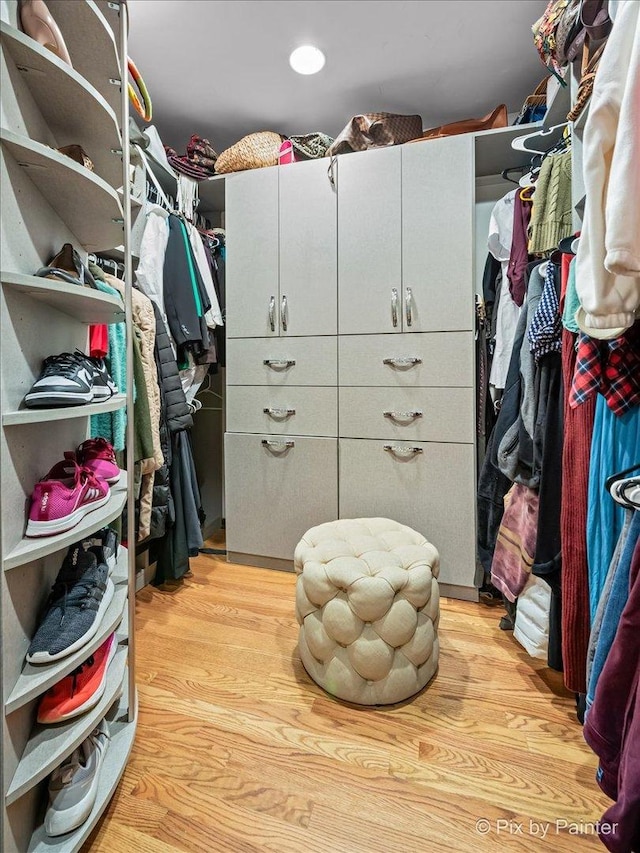 walk in closet featuring light wood-type flooring