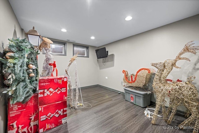 playroom featuring baseboards, visible vents, dark wood-type flooring, and recessed lighting