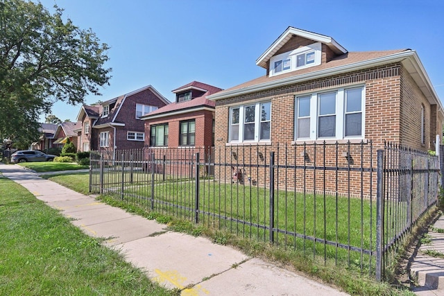 view of front of home with a front yard