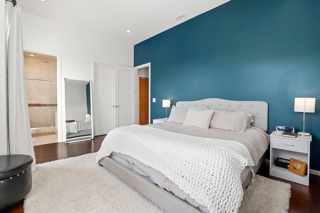 bedroom featuring dark hardwood / wood-style floors