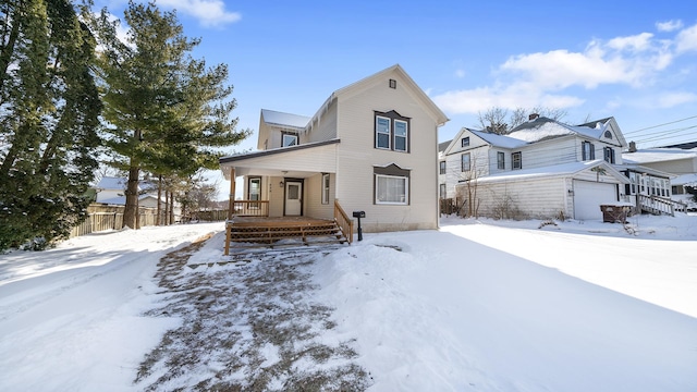 view of front of house with a garage and covered porch