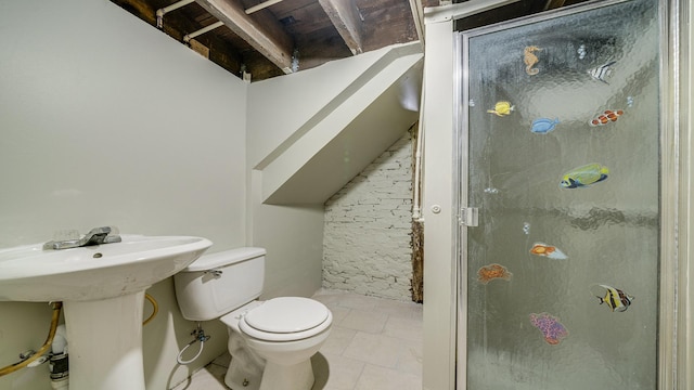 bathroom with sink, toilet, and walk in shower