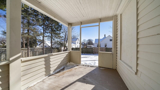 sunroom / solarium featuring wooden ceiling