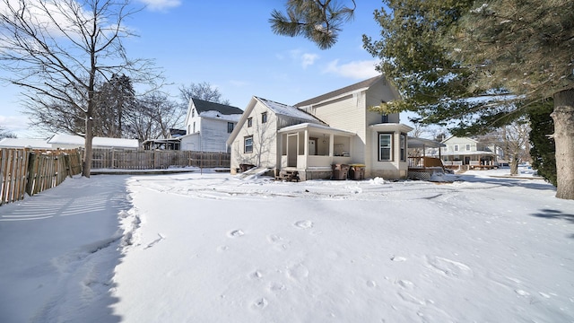 view of snow covered property